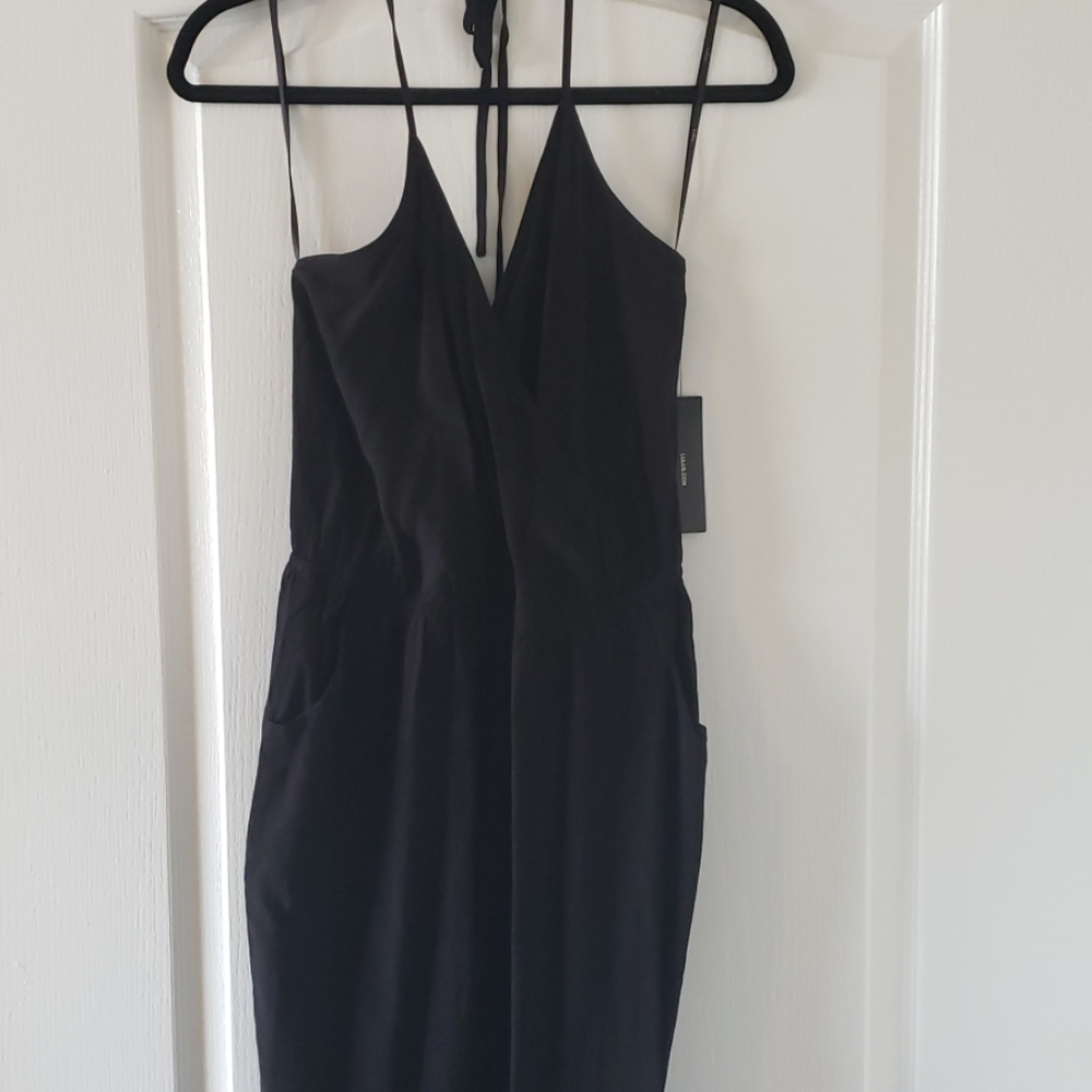 NWT Black skinny leg jumper